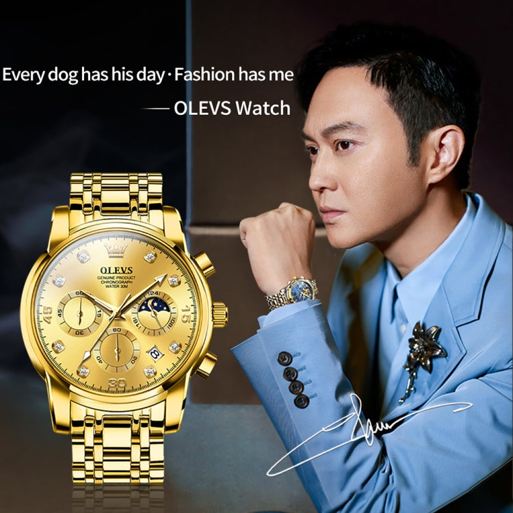 Men's gold multifunction quartz watch worn on wrist, with three subdials and date window