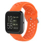 Orange silicone sport wrist strap with perforations and metal pin buckle