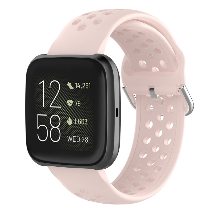 Light pink silicone sport wrist strap with perforations and metal pin buckle