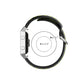 Black silicone sports watch strap with green accents and metal clasp buckle