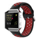 Fitbit silicone watch strap with black base and red accents, perforated sporty design