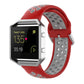 Fitbit silicone watch strap in red with perforated sporty design and pin buckle