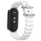 White silicone watch band with perforated links and metal clasp, side view