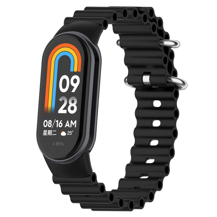 Black silicone watch band with perforated links and metal clasp for fitness tracker
