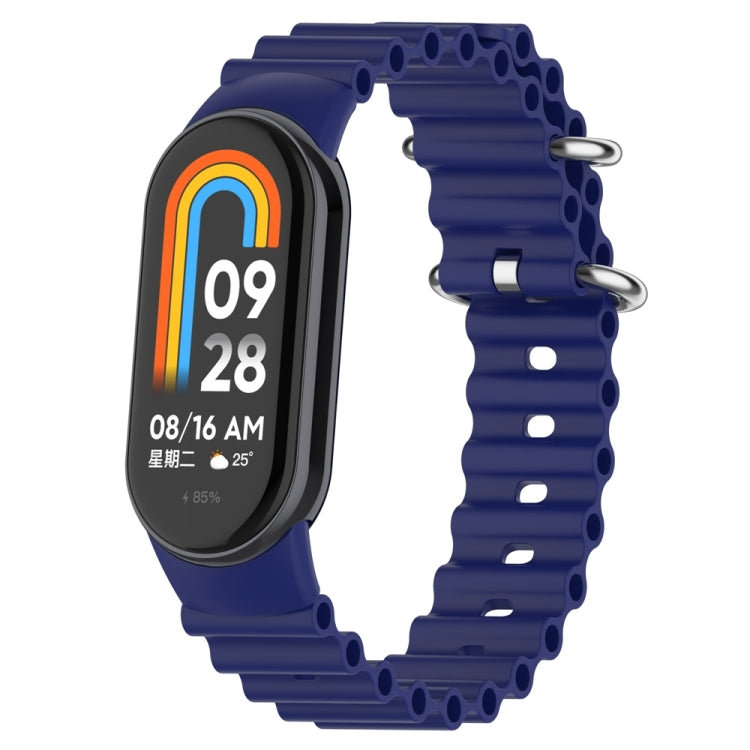 Blue silicone watch band with perforated links and metal clasp for fitness tracker