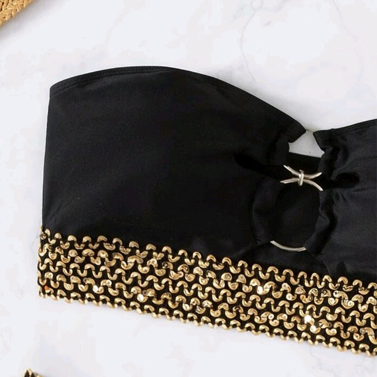 Black bandeau bikini top with gold chain trim and front ring hardware, laid flat