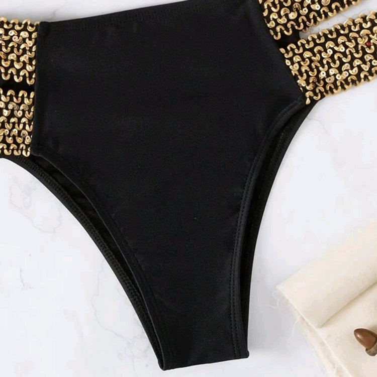 Black high-waist bikini bottom with gold chain-trim panels, flat lay