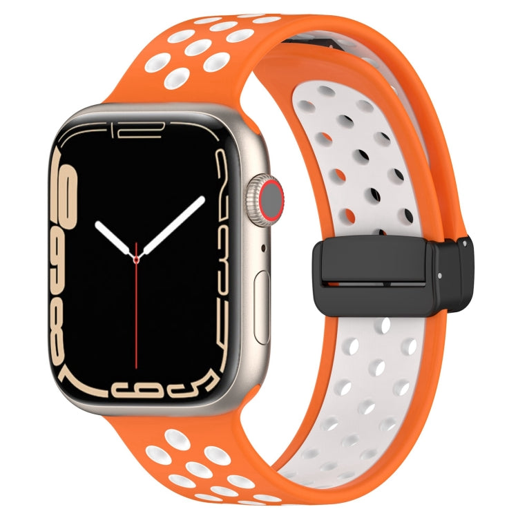 Silicone watch band with orange perforated strap and black magnetic buckle
