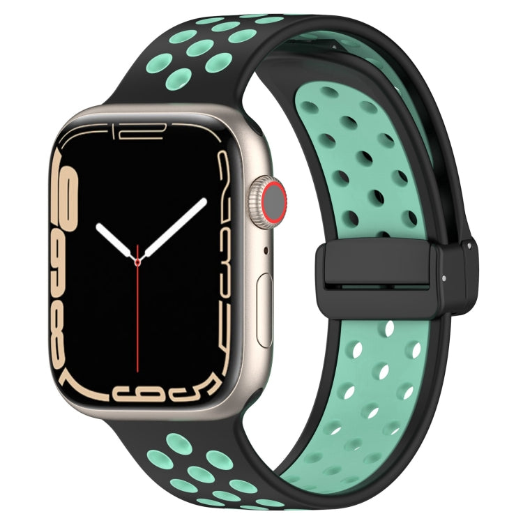 Teal silicone watch band with magnetic buckle, perforated sport-style holes.