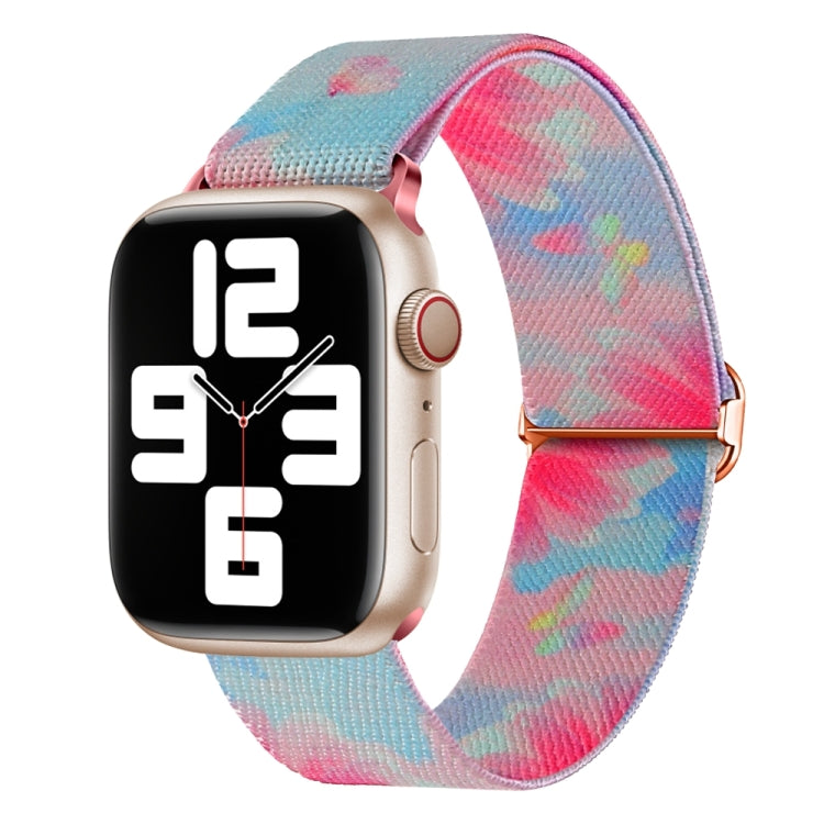 Pink and blue painted nylon watch band with colorful pattern and metal clasp buckle