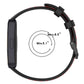 Black silicone watch band with red accent stripes and adjustable buckle