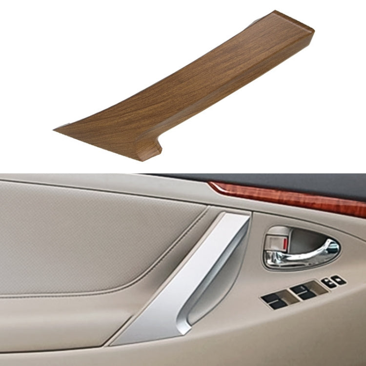Brown interior door handle cover for Toyota Camry, installed on door panel