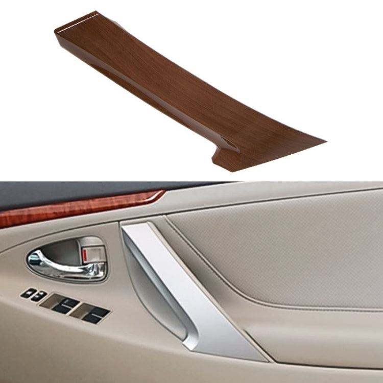 Brown interior door handle cover for Toyota Camry, installed on door panel