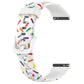 White silicone watch band with colorful rainbow dot print and pin-and-prong clasp