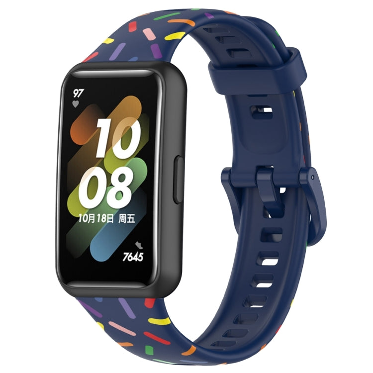 Midnight blue silicone smartwatch band with rainbow dot confetti pattern and buckle-style clasp