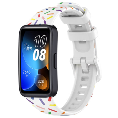 Silicone sports watch band with rainbow dot pattern, white strap and adjustable buckle