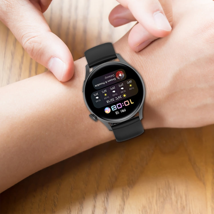 Silicone watch band with stainless steel buckle, black, worn on wrist