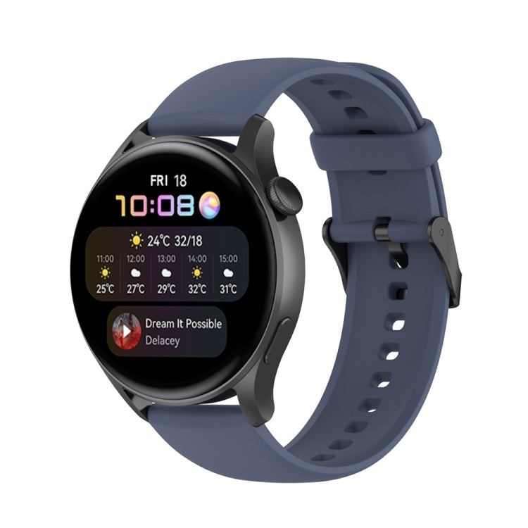 Navy blue silicone watch band with stainless buckle, front view with perforations