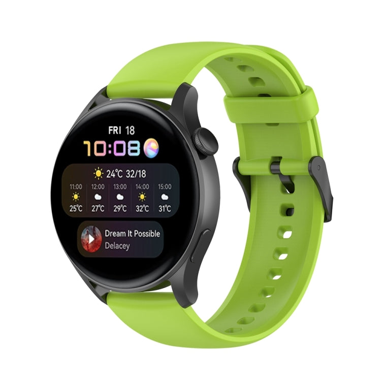 Lime green silicone watch band with stainless steel buckle and perforated strap holes