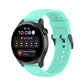 Light teal silicone watch band with stainless steel buckle and perforated strap holes