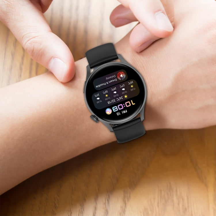 Black silicone watch band with stainless steel buckle on a wrist, adjustable holes