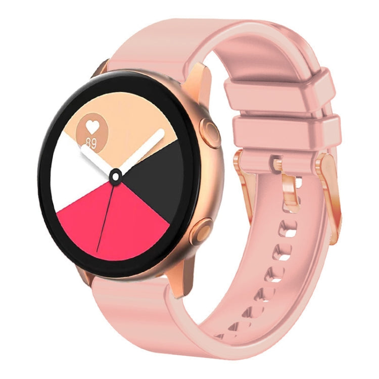 Light pink silicone watch band with rose gold buckle and pin-and-hole strap