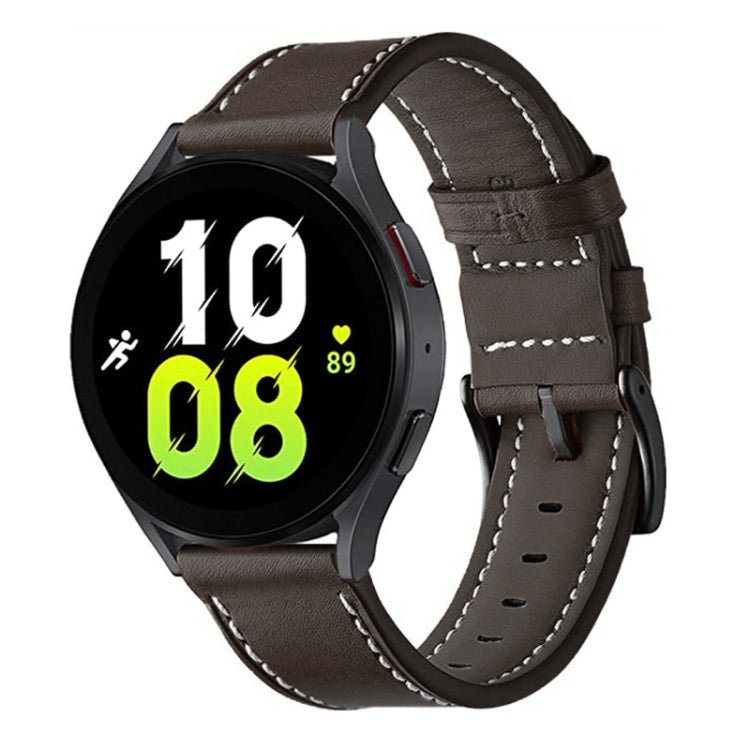 Brown leather watch band with buckle, stitched edges, and perforated adjustment holes