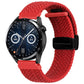 Red woven watch band with magnetic fold clasp and black connector tab