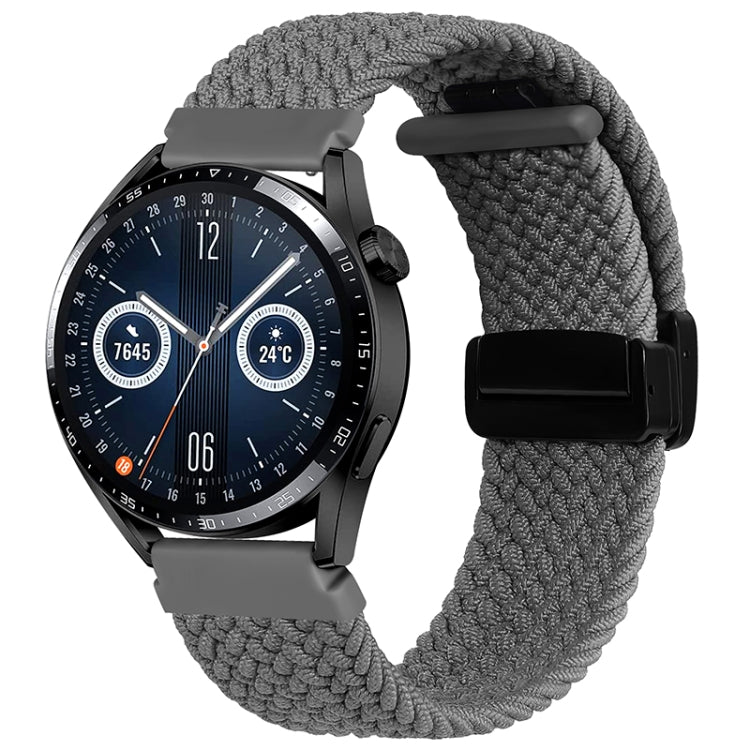 Grey woven watch band with magnetic fold clasp and black connector tab