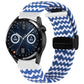 Blue-and-white striped woven watch band with magnetic fold clasp and black tab