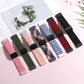 Assorted woven watch bands with black magnetic clasps in multiple colors