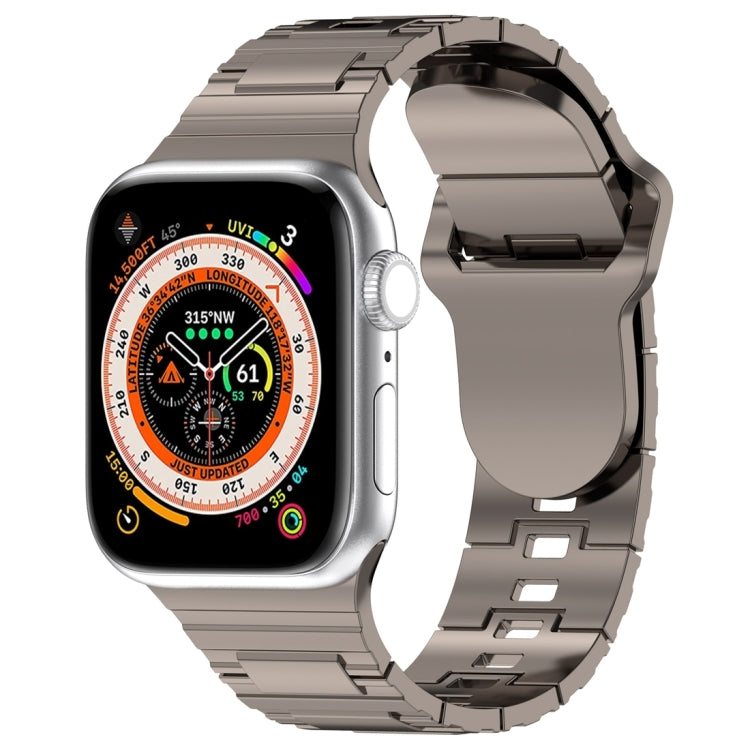 Square buckle armor watch band with silver metal accents and rugged links