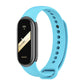 Silicone watch band with perforated strap holes, blue color, for fitness tracker