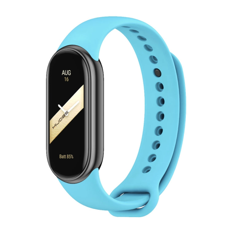 Silicone watch band with perforated strap holes, blue color, for fitness tracker
