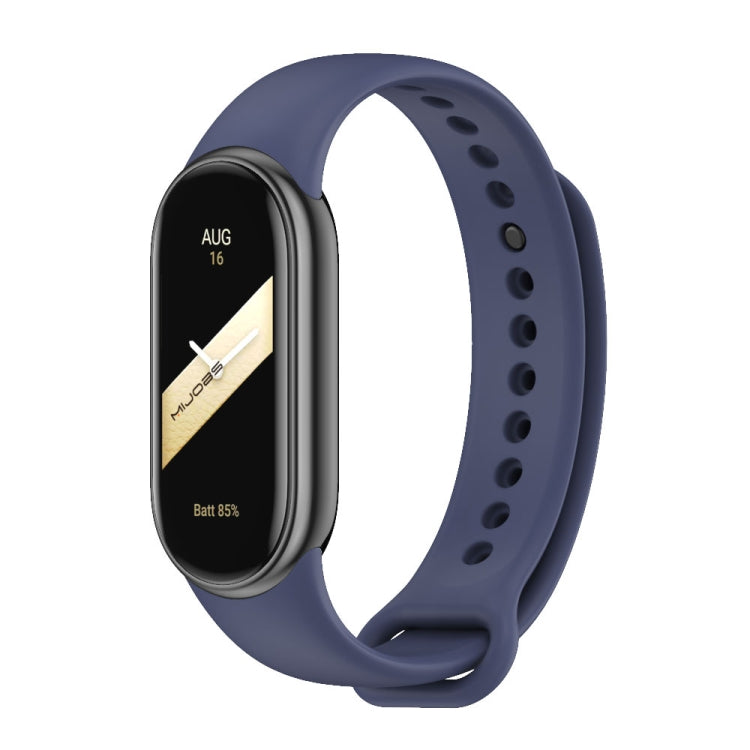 Silicone watch band with perforated strap holes, dark blue color, for fitness tracker