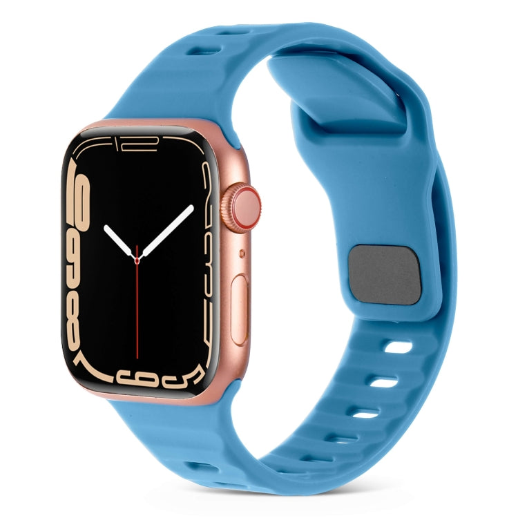 Silicone watch band with square buckle, striped pattern, light blue color.
