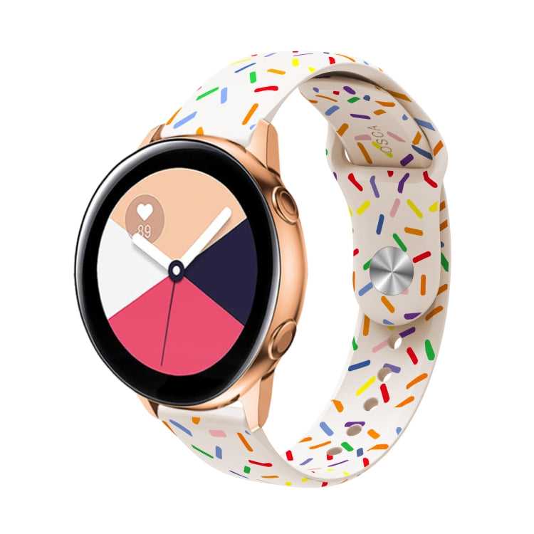 Rose-gold and black smartwatch with white rainbow-dots silicone band