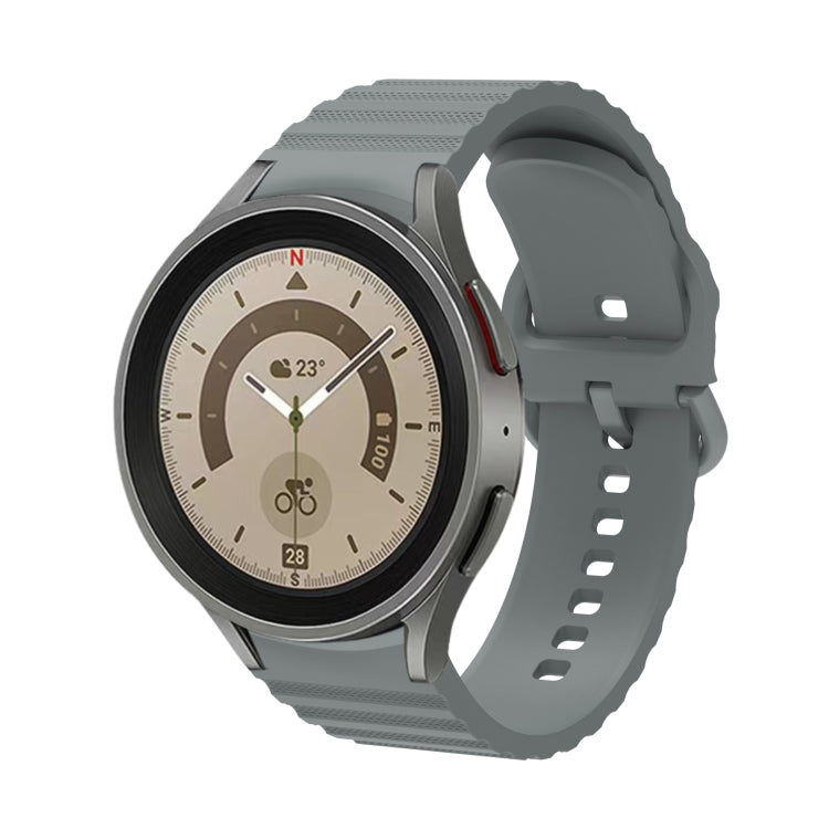 Light green silicone watch band with wave dotted texture and buckle, front view