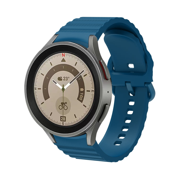 Blue silicone watch band with wave dotted texture and buckle