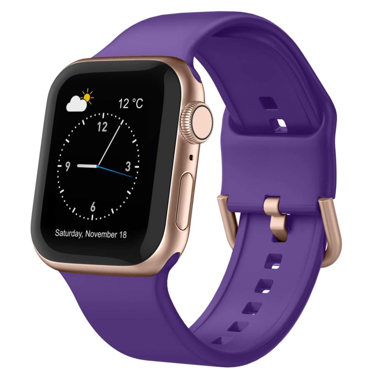 Silicone watch band with pin buckle, deep purple, with adjustable holes.