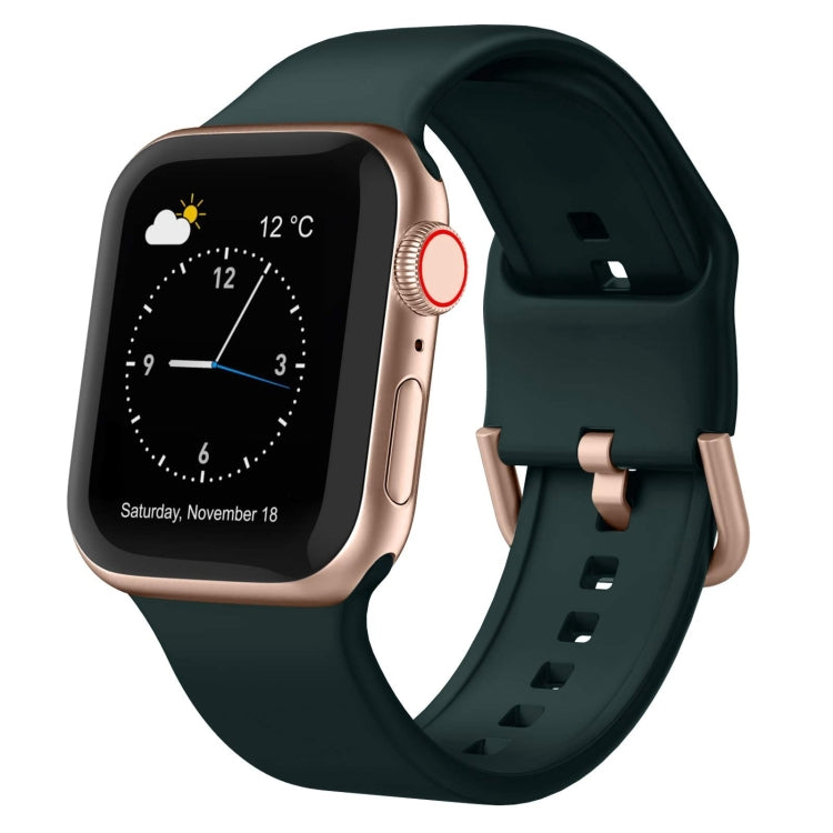 Dark green silicone watch band with pin buckle; perforated strap and rose-gold tone clasp
