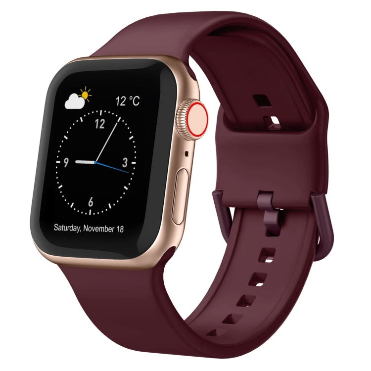 Silicone pin buckle watch band in burgundy with perforated strap holes
