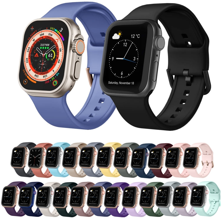Assorted silicone watch bands with pin buckles in multiple colors for Apple Watch.
