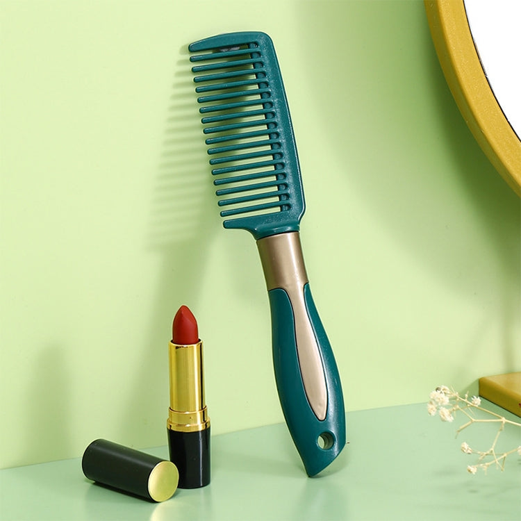 Curly hair massage comb with teal bristles, copper-toned handle, and finger grips