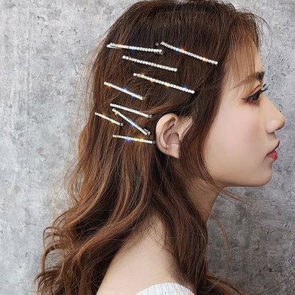 Rhinestone hair clip set of 4, silver bar clips on model’s bangs