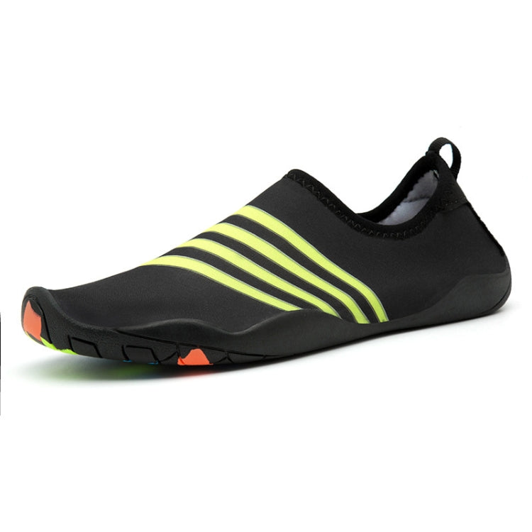Black slip-on beach swim shoes with lime stripe bands and patterned toe guard