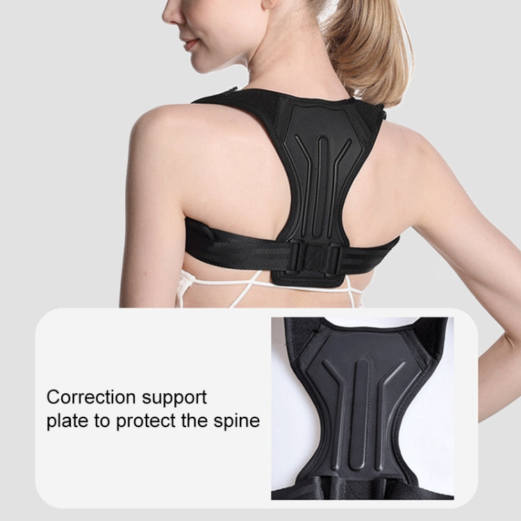 Black posture correction belt showing spine support plate detail under shoulder strap