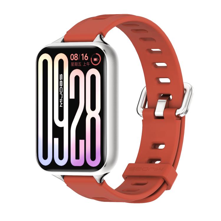 Silicone watch band with perforated holes, orange-red color, side buckle view