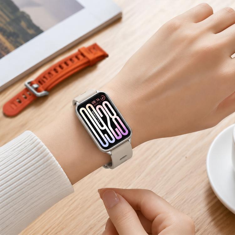 Silicone watch band with perforated holes, light gray, worn on wrist