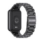 Black three-bead stainless steel watch band, close view of band and latch